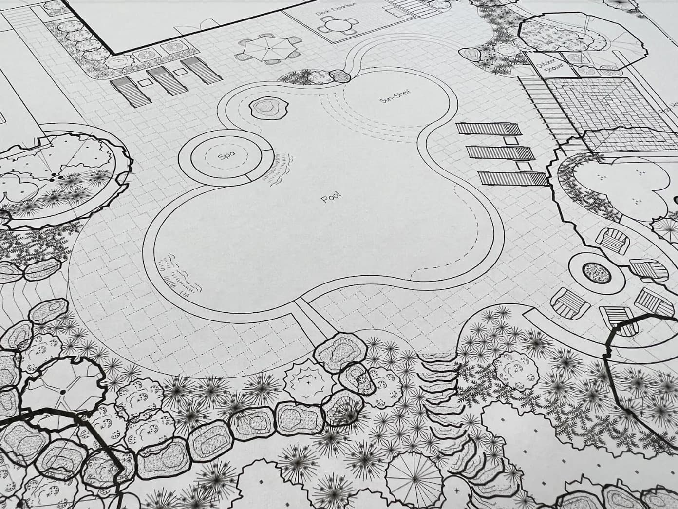 Aerial view of luxury outdoor construction project in progress showcasing Redwood's coordination of trades